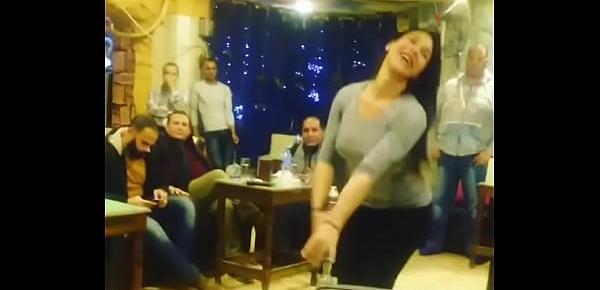  arab girl dancing with friends in Cafe